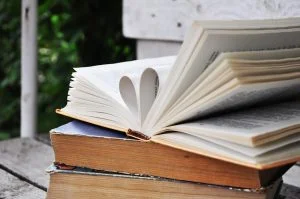 a book with pages forming a heart