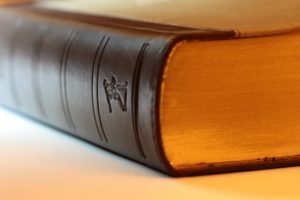 A close up of a book corner with hardcover binding